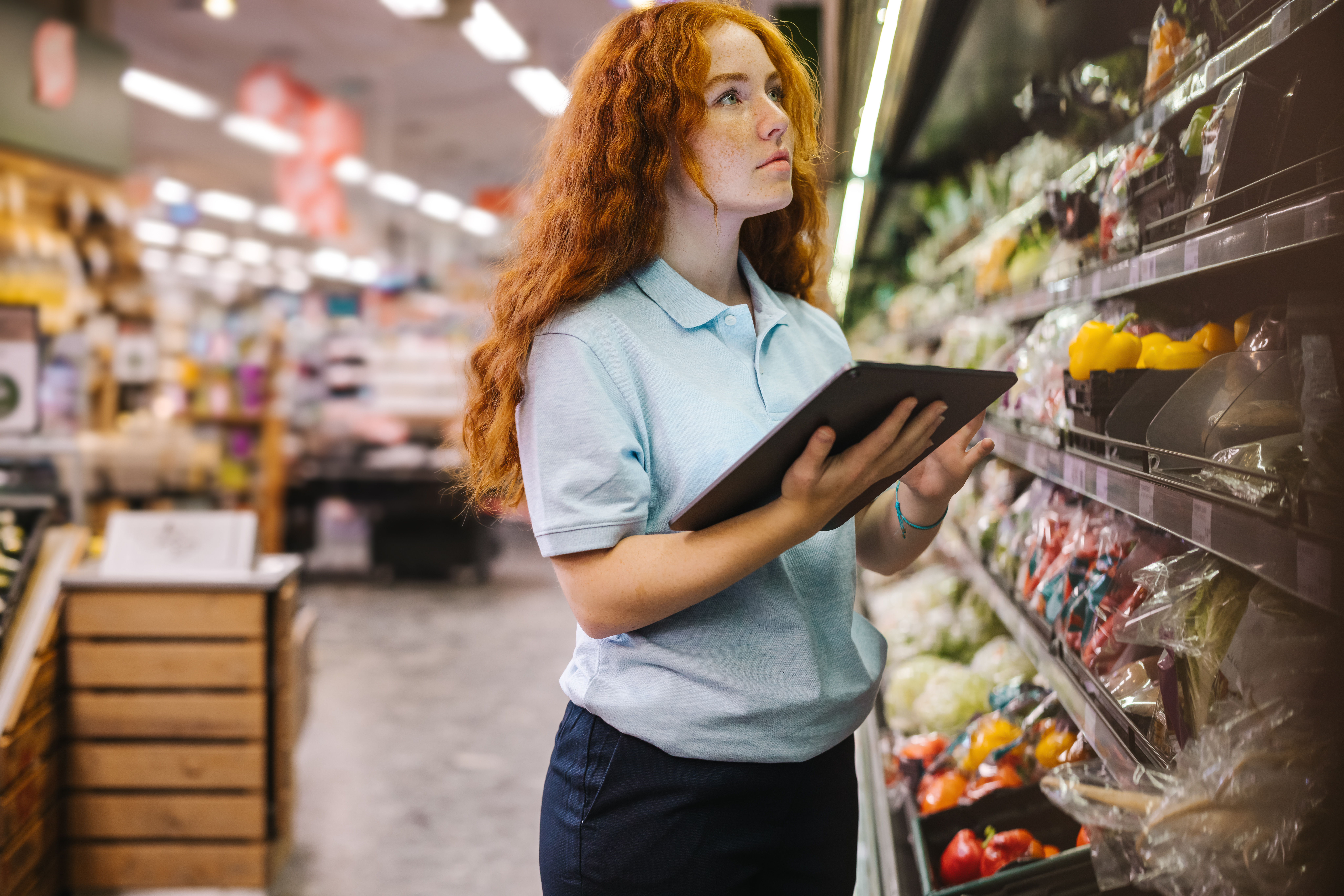 Woman,Using,A,Digital,Tablet,While,Doing,Inventory,Check,In
