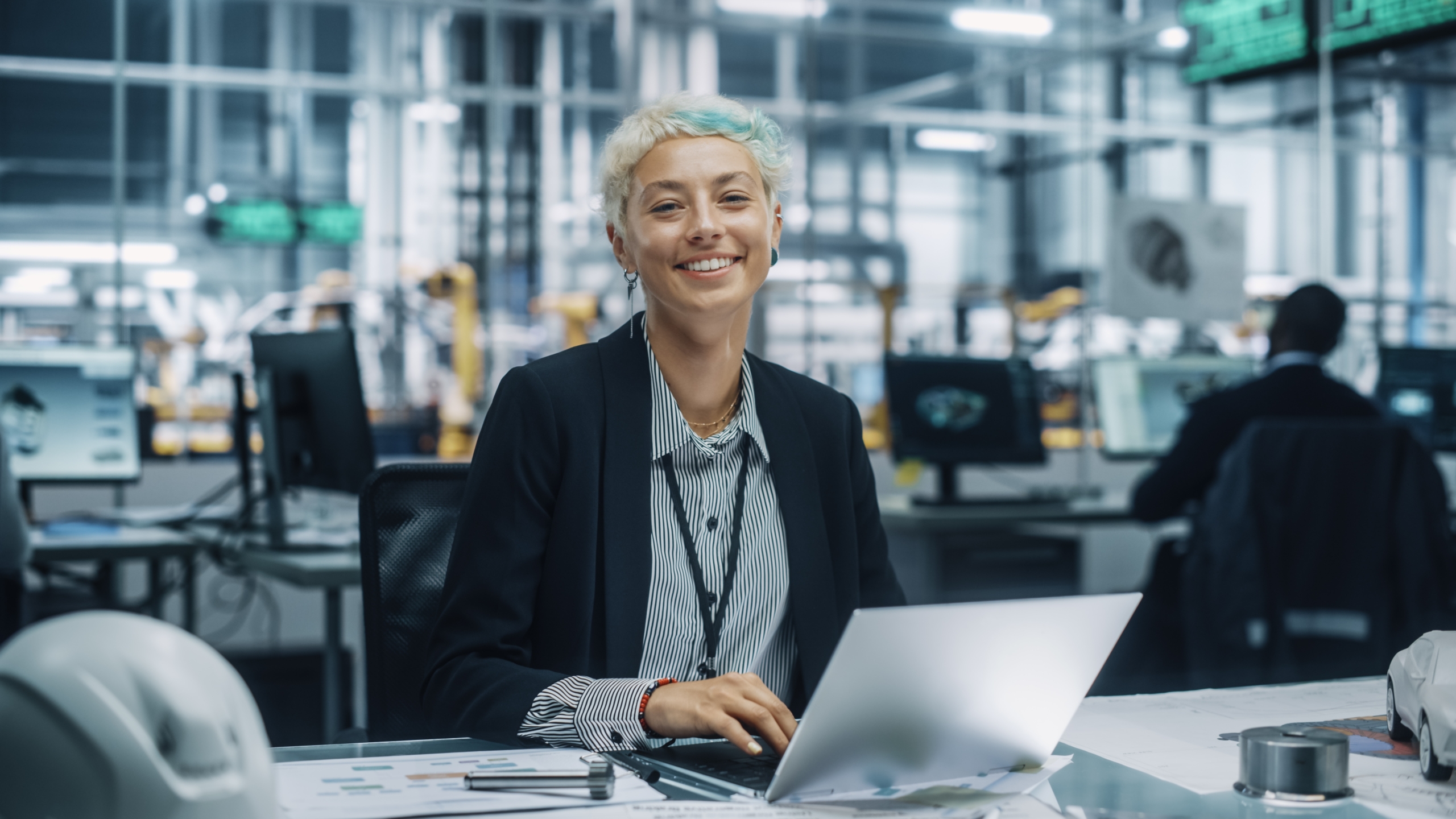 Portrait,Of,A,Happy,Young,Beautiful,Female,Engineer,Sitting,At