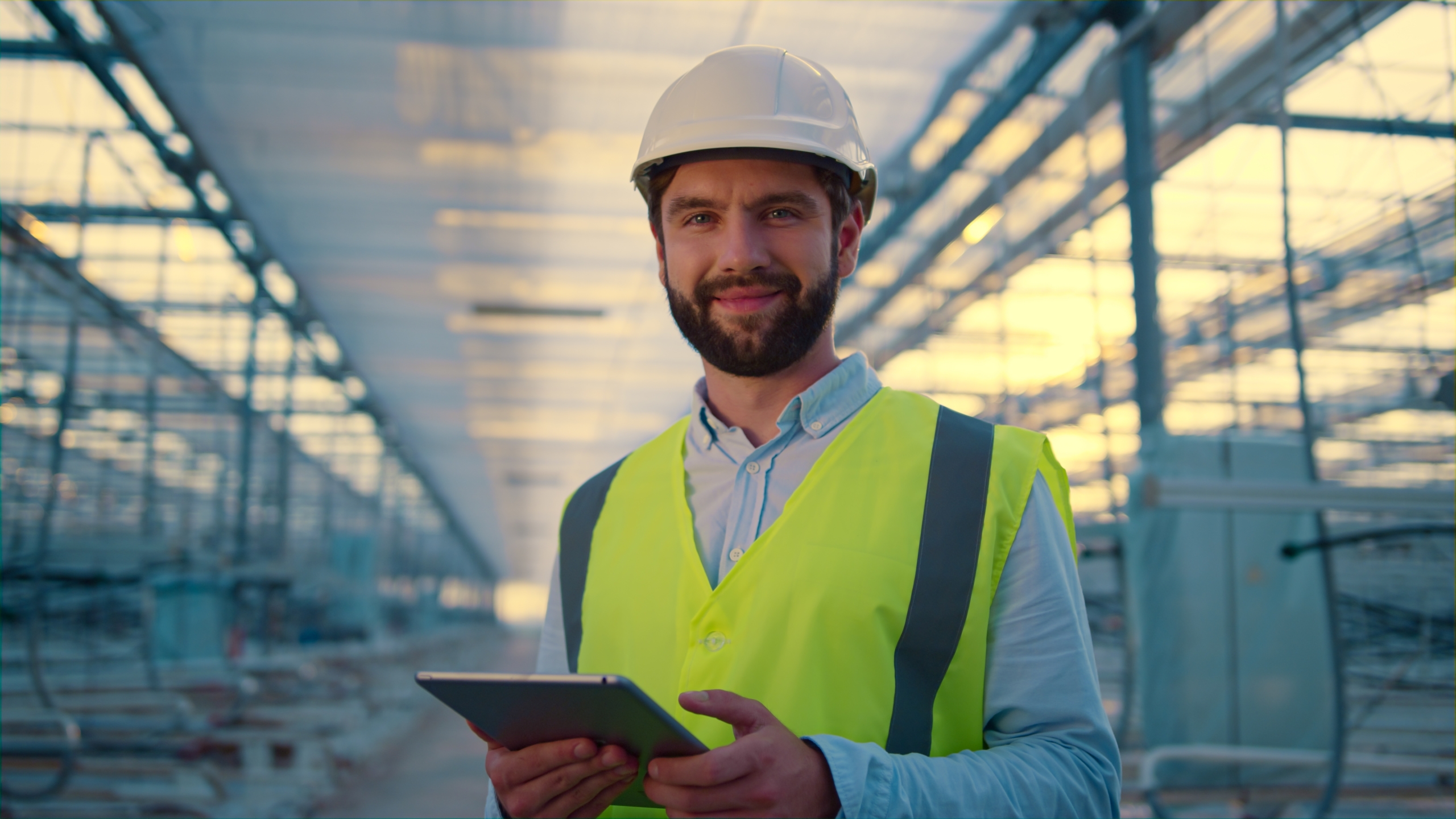 Happy,Engineer,With,Tablet,Collecting,Production,Data,Analysing,Efficiency.,Hardworking
